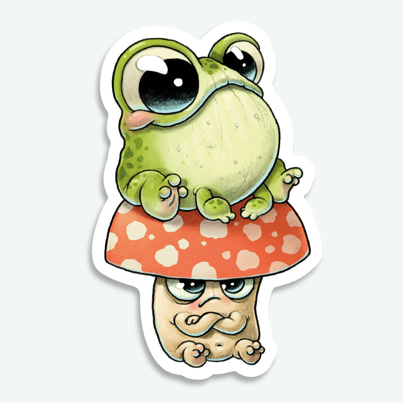 The Toad Stool Sticker from Bindlewood Shop features a cheerful cartoon frog with big eyes atop a grumpy red and white mushroom. With a smooth matte finish, this vinyl sticker brings Chris Ryjniak-inspired charm to any surface.