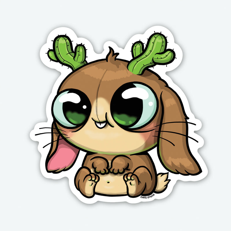 The Cactalope Sticker from Bindlewood Shop features a cute cartoon creature with big green eyes, bunny-like ears, cactus antlers, and a round body—perfect as a colorful vinyl sticker to add to your collection.
