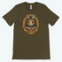 Explore "The Maker" Tee by Bindlewood Shop, an olive green, gender-neutral T-shirt featuring Amanda Louise Spayd's charming design of a grinning, bug-eyed rabbit in a suit with ornate gold detailing and "Maker" inscribed elegantly—ideal for fans of whimsical art.
