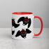 A white ceramic mug with a red interior and handle is shown on a light gray surface. The Mothman Cryptid Mug from Bindlewood Shop features a repeating design of cute black, fluffy creatures with bright red eyes and wings, reminiscent of Amanda Louise Spayd's whimsical style. The creatures appear to be in different flying poses.
