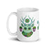 The Succulent Mug from Bindlewood Shop showcases a charming, cartoonish green creature with antlers embellished with succulents. The creature's large eyes and a plant wreath around its neck, along with tiny potted plants dangling from its antlers, make it adorable. Additionally, it's dishwasher safe for convenient cleaning!